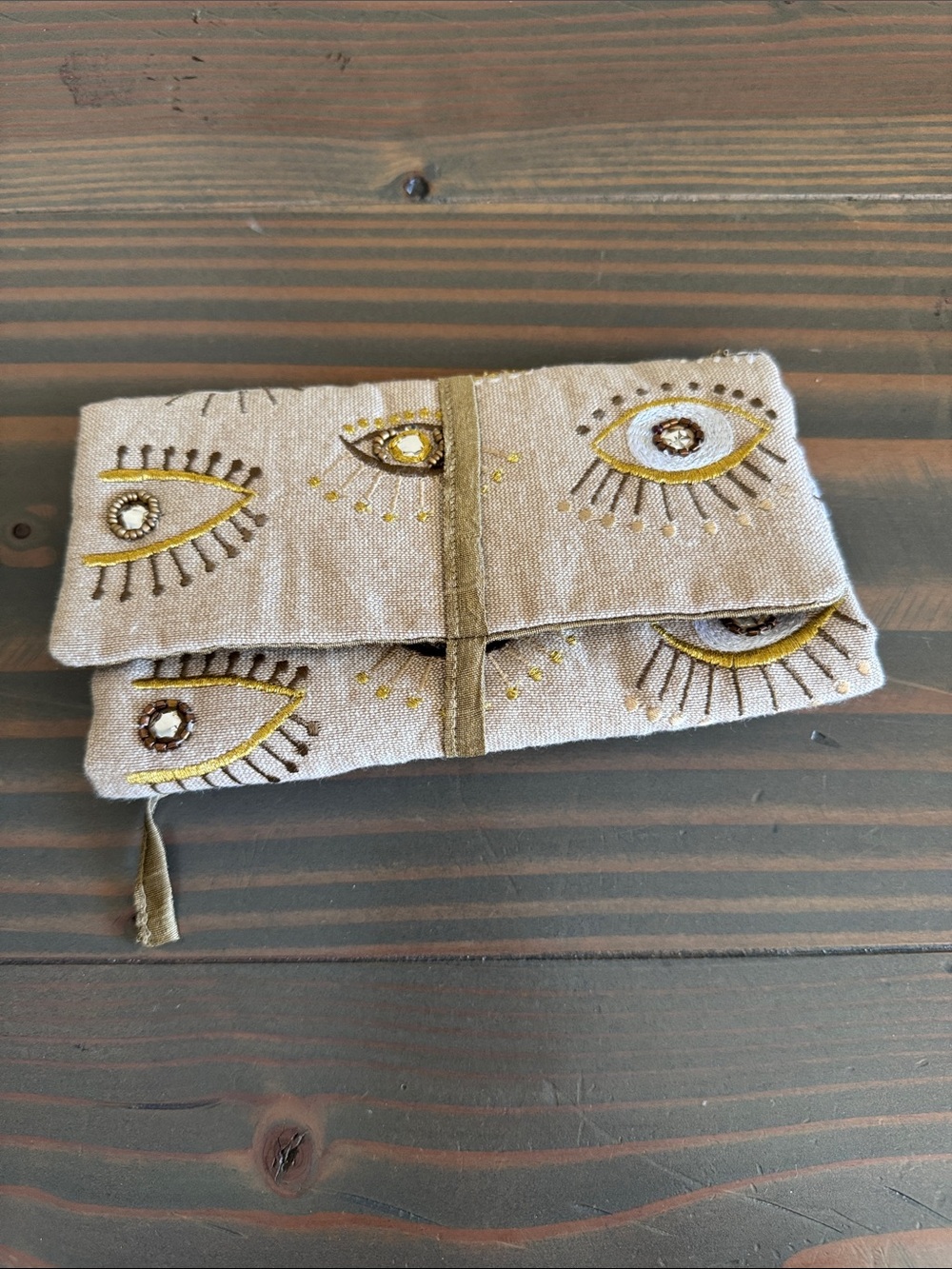 Embroidered Eye Motif Linen Jewelry Travel Clutch in Beige and Gold